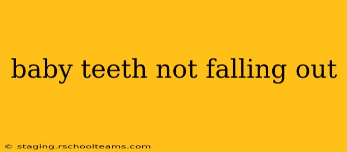 baby teeth not falling out