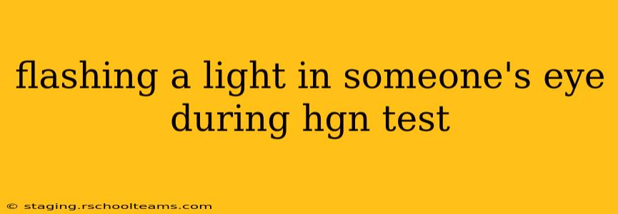 flashing a light in someone's eye during hgn test