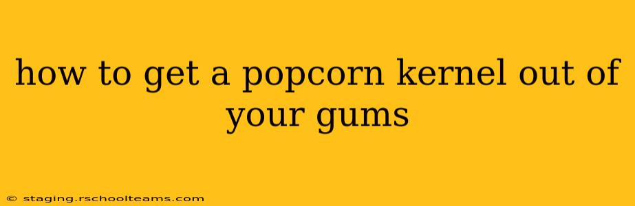 how to get a popcorn kernel out of your gums