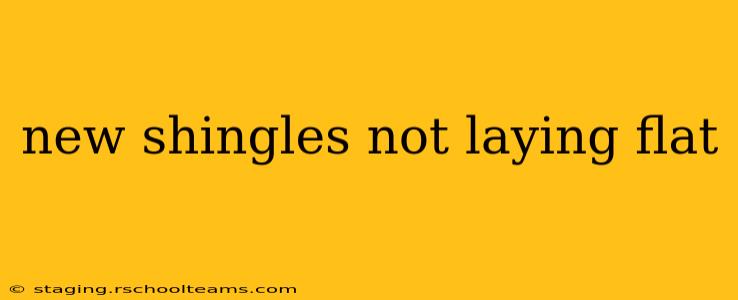 new shingles not laying flat