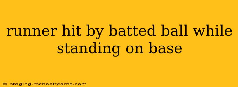 runner hit by batted ball while standing on base