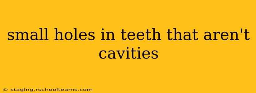small holes in teeth that aren't cavities